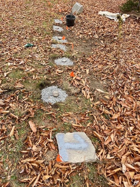 Newly unearthed metal grave markers on Avenue C